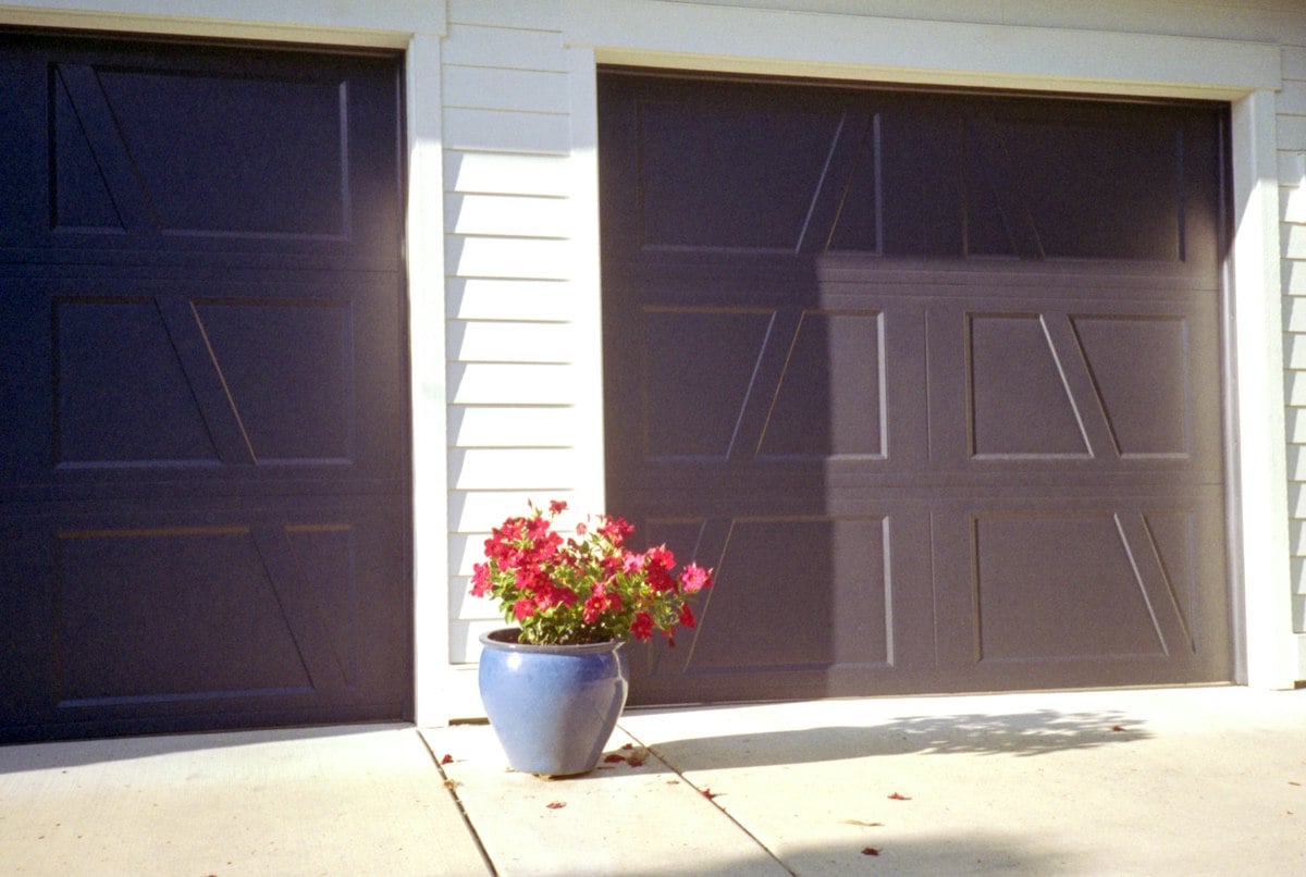 Paneled garage doors on a residential building